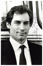 Load image into Gallery viewer, Collage of all the Stars that Portrayed James Bond with their Authenticated Signatures