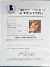 Load image into Gallery viewer, Stevie Ray Vaughan with Signed Album Cover and Fender Stratocaster