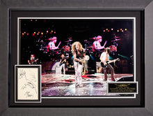 Load image into Gallery viewer, Color Photo of Aerosmith in Concert with an Authenticated Signed Card
