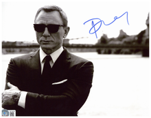 Load image into Gallery viewer, Daniel Craig as James Bond with Beckett Authenticated Signature
