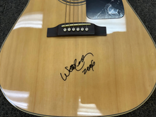 Load image into Gallery viewer, Willie Nelson with a JSA Authenticated Signed Guitar

