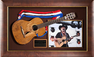 Willie Nelson with replica "Trigger" Guitar and PSA authenticated signed Photograph