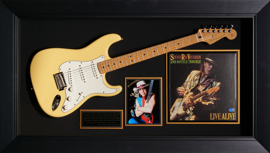 Stevie Ray Vaughan with Signed Album Cover and Fender Stratocaster