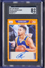 Load image into Gallery viewer, Signed Stephen Curry Card With NBA Replica Championship Rings
